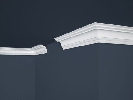 La moldura Cornisa E14 50x50mm. x 2mts.  Marbet Design Esta moldura aporta elegancia y sofisticación a cualquier espacio interior. Con líneas suaves y curvas delicadas, esta moldura cornisa refleja una estética clásica y atemporal, evocando tradición y refinamiento. Fabricada con poliestireno extruido de alta densidad, esta moldura ofrece durabilidad y resistencia, creando ambientes acogedores con un acabado impecable.